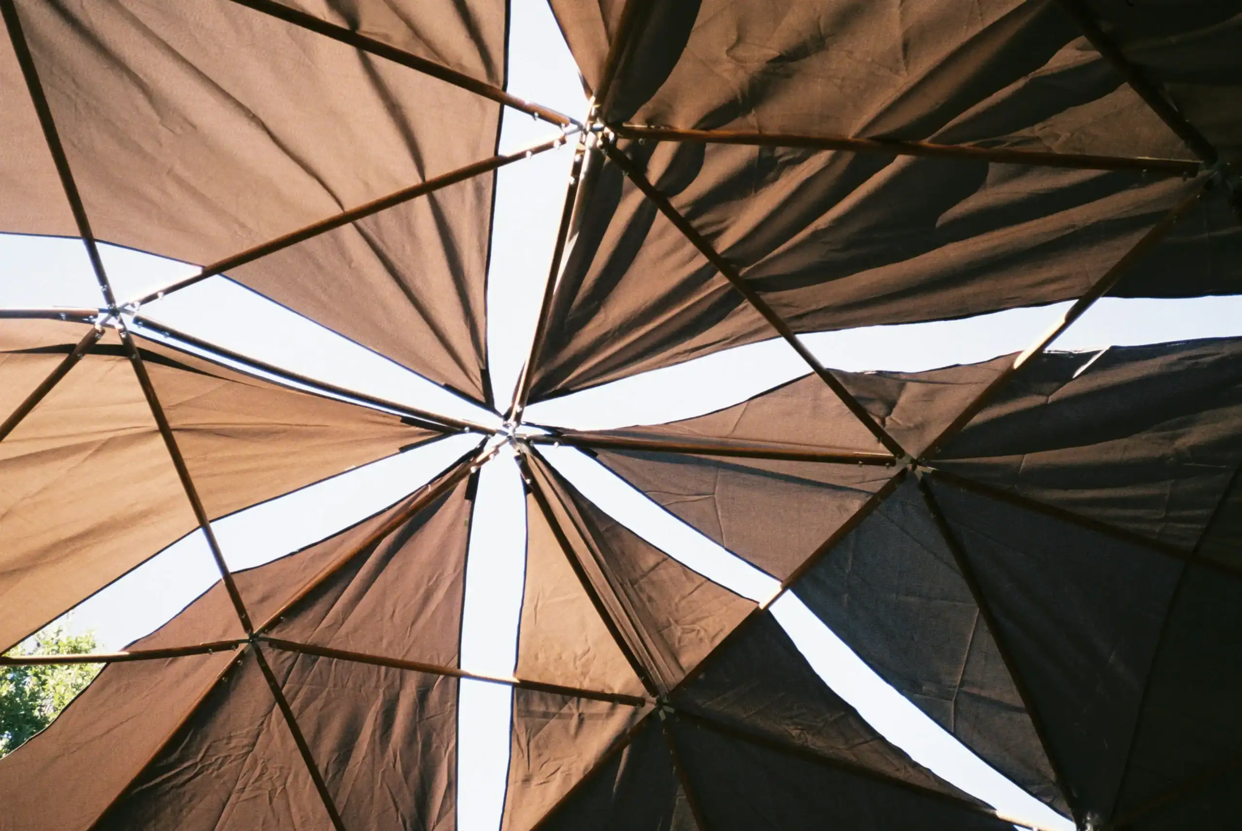 Colorful outdoor sunshade canopy at Kelyland Outdoors for shade and relaxation.