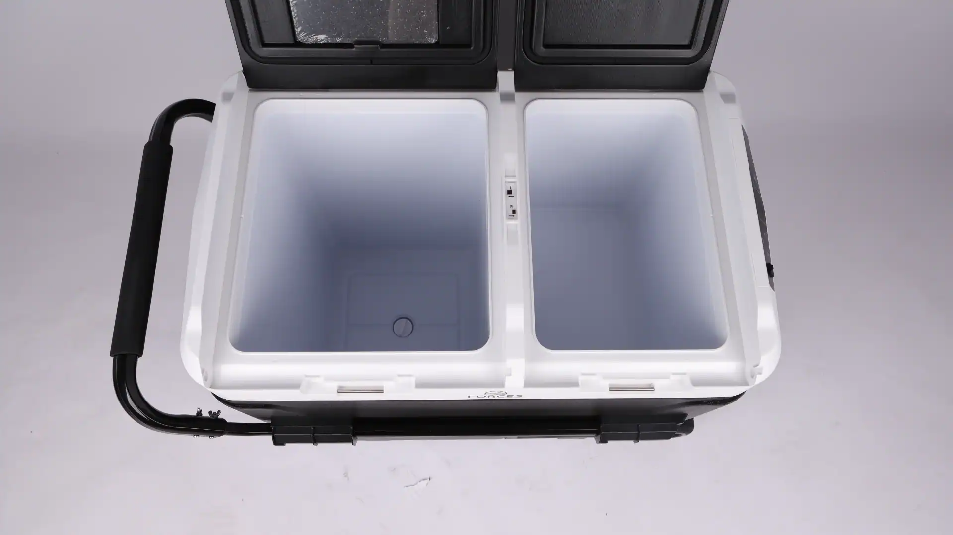 Inflatable Tent Setup Time vs Pole Tents: Retail Data 109 Top view of a dual-compartment camping cooler with open lids, featuring a durable handle and spacious insulated compartments.