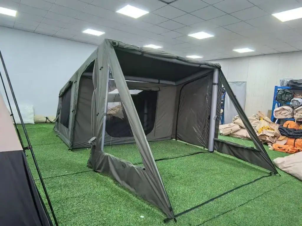 Smart Tent Sourcing: How Kelyland Closed the Quality Gap 1 Portable outdoor camping tent with extended awning on artificial grass.
