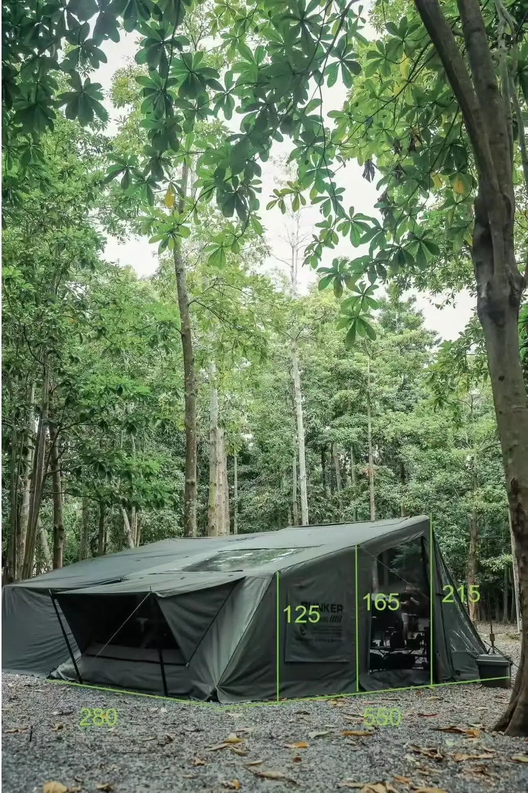 Tent Fly Replacement: 5 Fit Checks for Inflatable Tents 19 Large outdoor camping tent set up in a lush green forest.