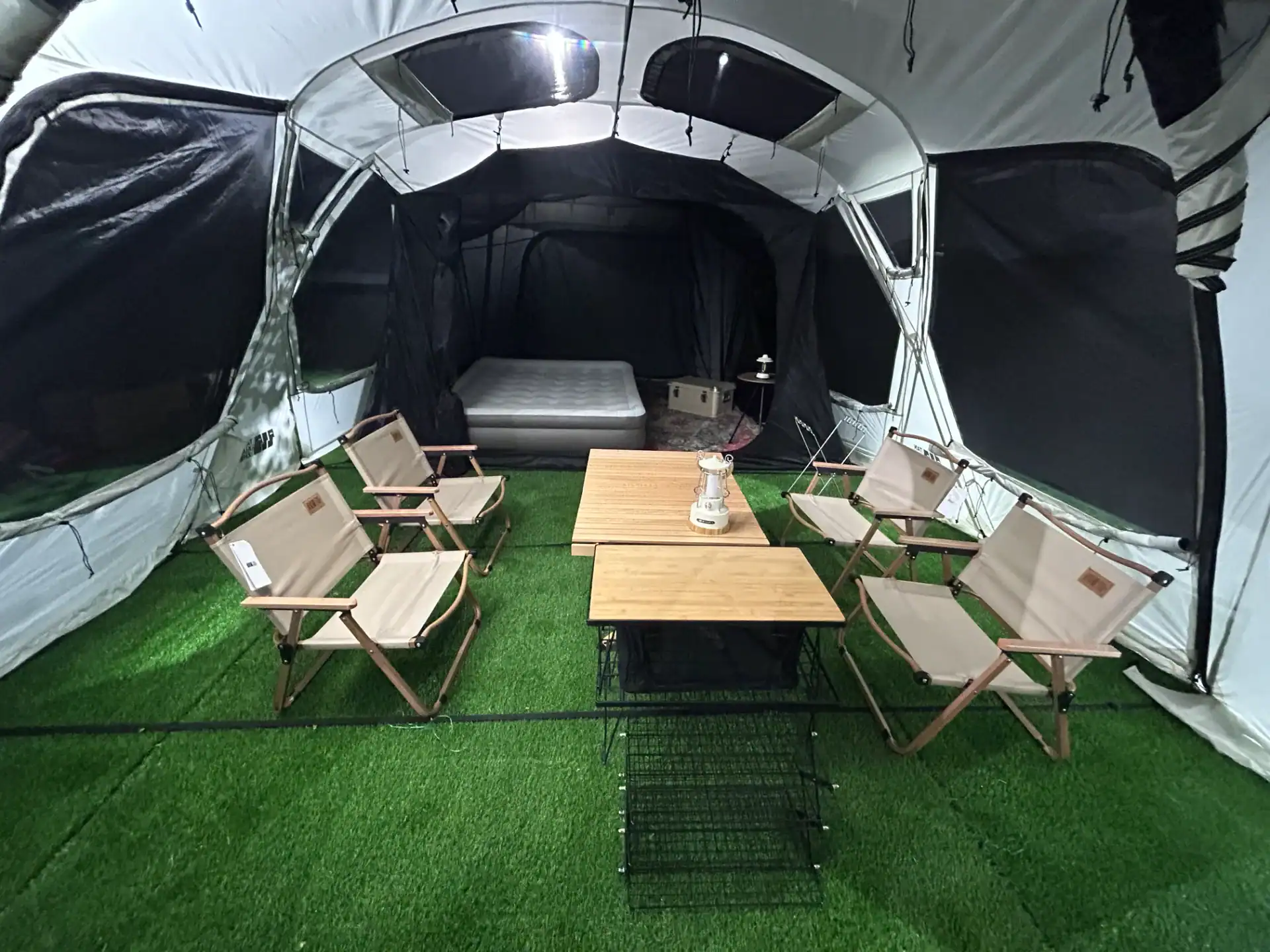 Glamping Tent Condensation: 5 Proven Fixes for Suppliers 12 Kelyland Outdoors tent with seating area and artificial grass flooring.