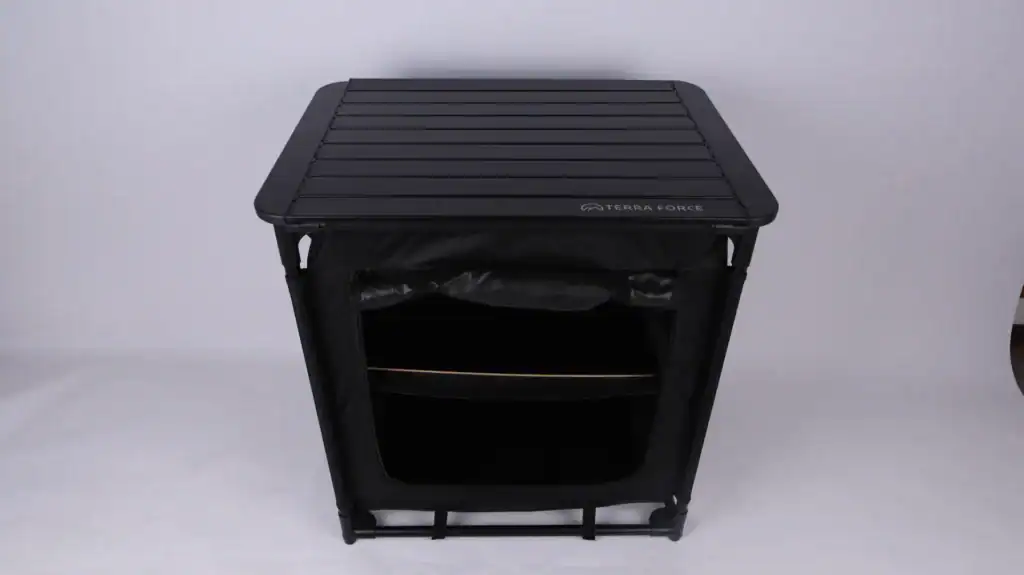Black outdoor storage box with a slatted lid on a white background.