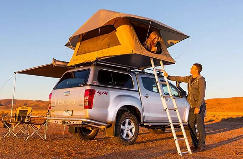 7 Smart Tent Features Worth Adding in 2026 3 Spacious roof tent setup on a silver SUV for camping.