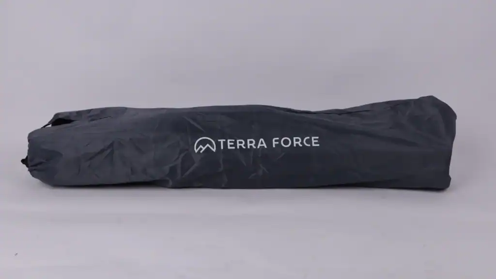 Dark gray Terra Force camping gear bag with crinkled fabric on a plain light background, showcasing the logo.