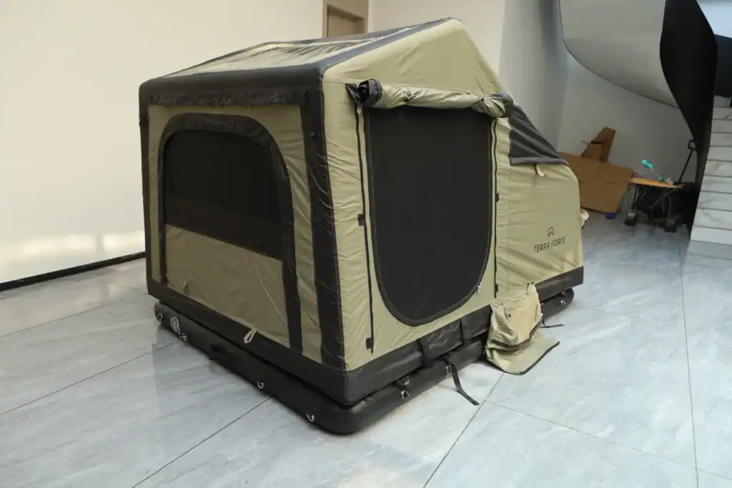Portable outdoor camping tent with mesh windows and waterproof fabric.