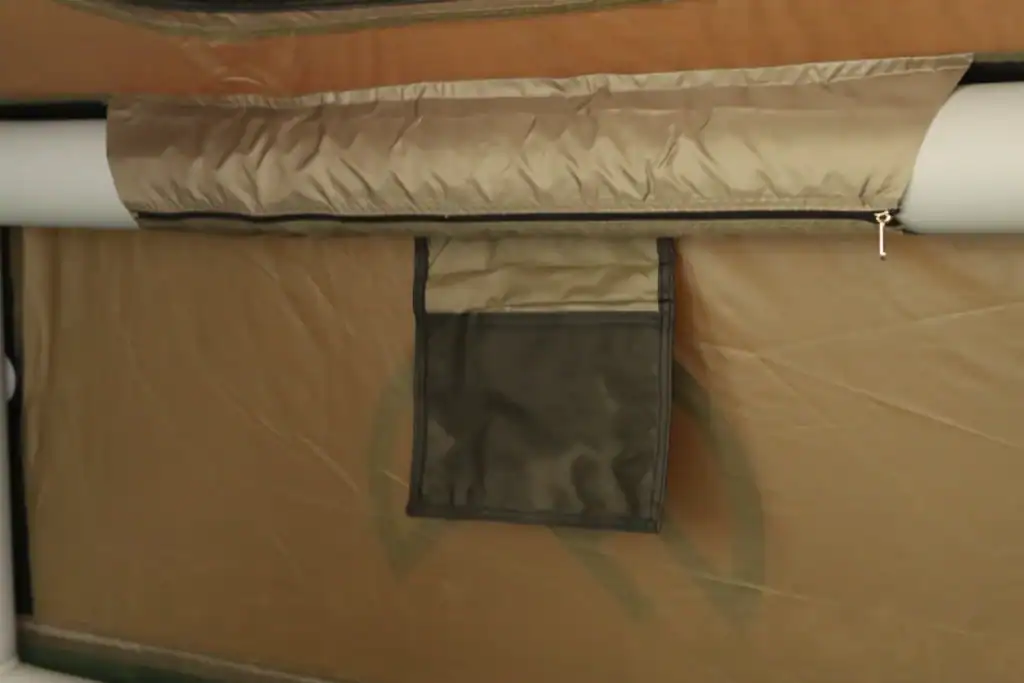 Kelyland Outdoors portable outdoor screen or tent setup for camping or outdoor activities.